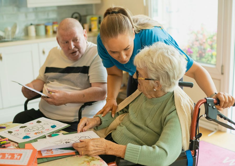 NDIS provider with a client in a supportive setting